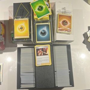 3 Pokémon celebration with Pokémon cards ,energy cards and trainers cards